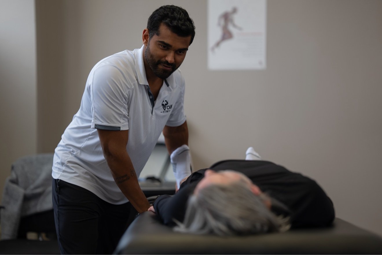 Assisted stretch therapy session at VCan Fitness studio in Brentwood, TN